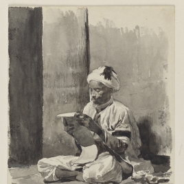 Seated Moroccan reading