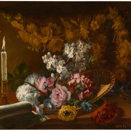 Flores con una vela y un papel