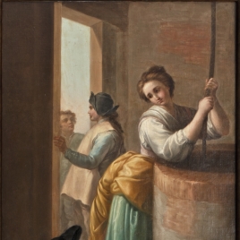 Mujer sacando agua de un pozo