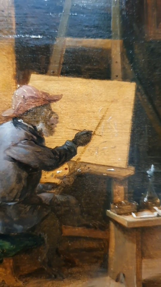 Cuadro mono como pintor con pincel