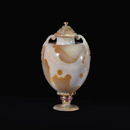 Agate urn with masks