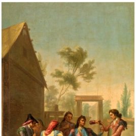 Varios hombres jugando a las cartas en el campo