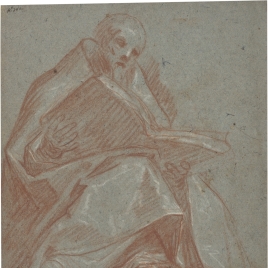 Figura de obispo sentado con un libro