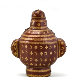 Case for two-spouted vase with the bust of a woman