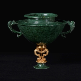 Cup with dolphin-shaped handles