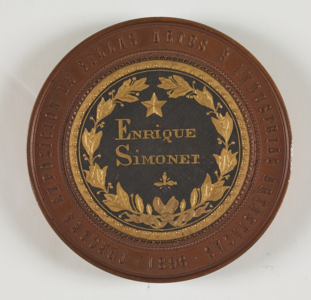 Medalla de primera clase concedida al pintor Enrique Simonet en la III Exposición de Bellas Artes e Industrias Artísticas de Barcelona en 1896