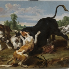 Toro rendido por perros