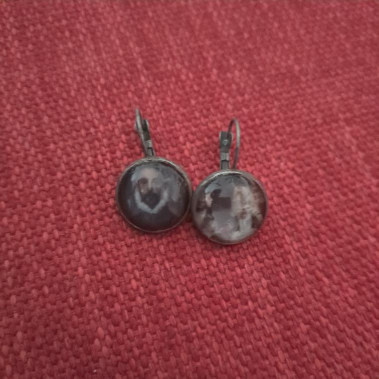 Pendientes de El caballero de la mano en el pecho